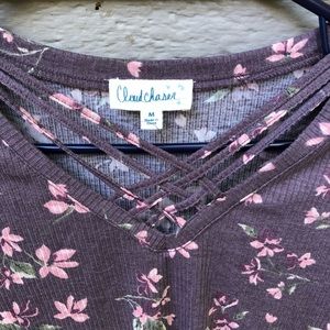 A Purple crossed shirt with flowers